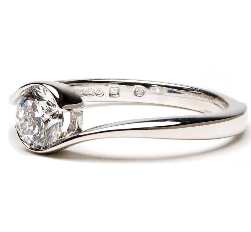 Ethically Sourced Platinum Crossover Solitaire Diamond Engagement Ring