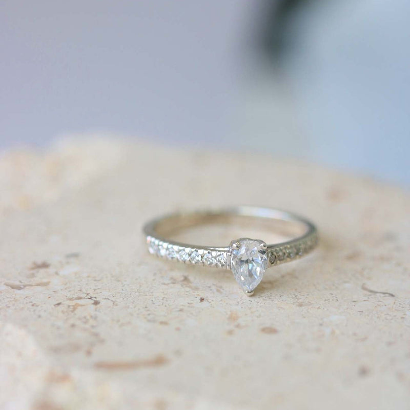 Ethically-sourced Platinum Pear Cut Diamond Engagement Ring with Diamond Set Shoulders