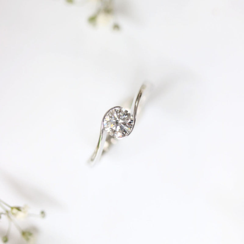 Ethically Sourced Platinum Crossover Solitaire Diamond Engagement Ring