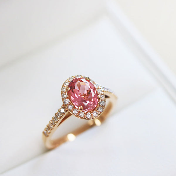 Fairtrade Yellow Gold Oval Cut Pink Tourmaline and Diamond Halo Engagement Ring