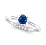 Fairtrade White Gold Solitaire Sapphire September Birthstone Ring, Jeweller's loupe